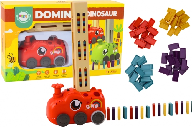 Rdeči dinozavrski baterijski vlak, ki postavlja barvni domino