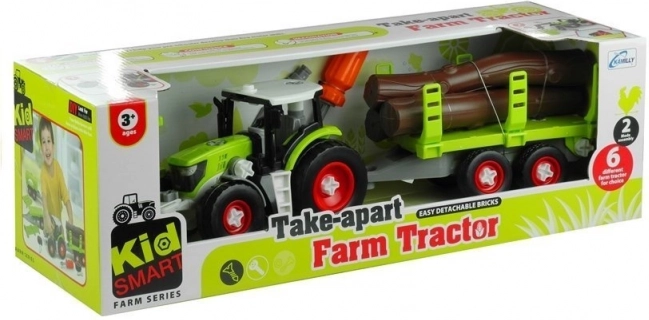 Zložljiv traktor s prikolico za les