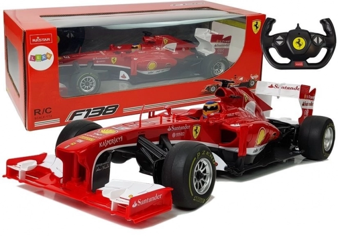 Dirkalni avto Formule 1 Ferrari F138 rdeče 1:12