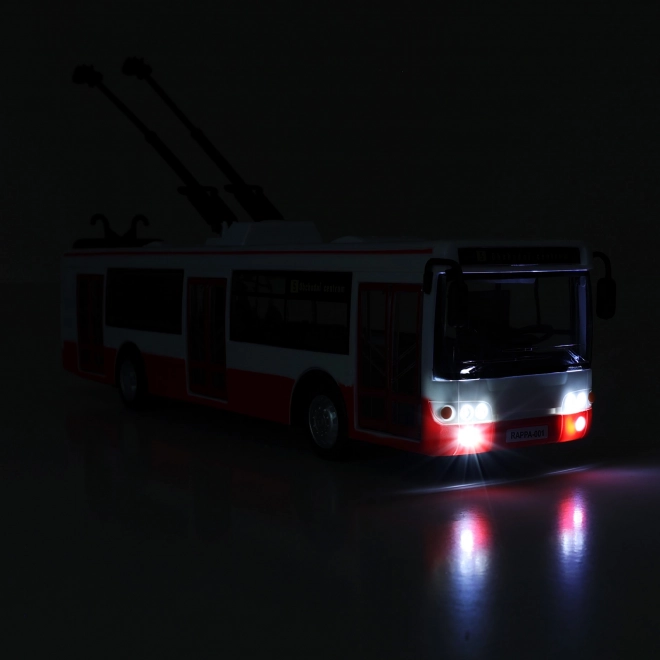 Trolejbus slovensko govoreči plast 29cm rdeč brezplačna vožnja na baterijah s svetlobo in zvokom v škatli 33x11x10cm
