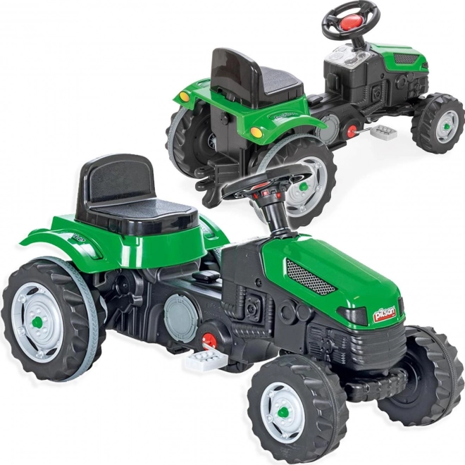 Zeleni pedalni traktor