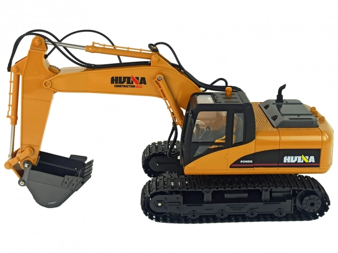Rumeni RC bager Caterpillar 1:14 na daljinsko upravljanje