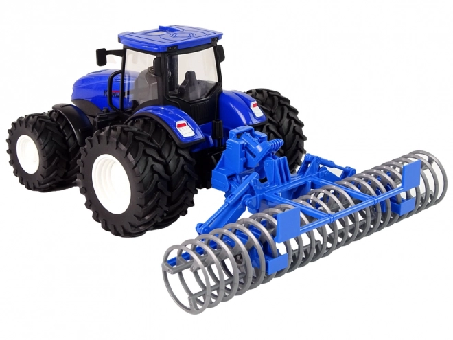 Daljinsko voden traktor 1:24 Blue Disc Aggregate Metal