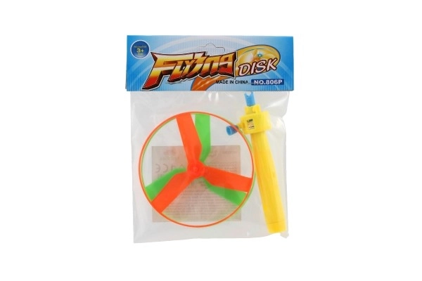 Izstrelek z vrtavko + zaganjalnik plast 9cm 2 barvi v vrečki