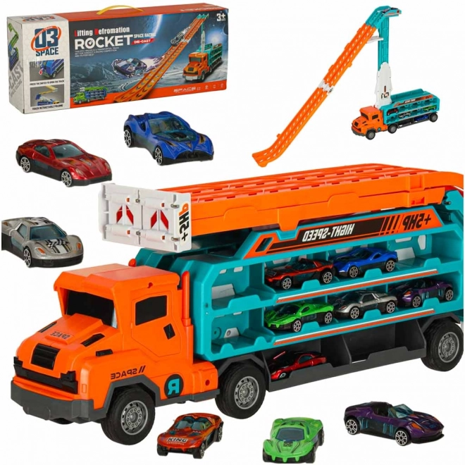 Dirkalna steza s avtovleko in transporterjem 6 delov - oranžna