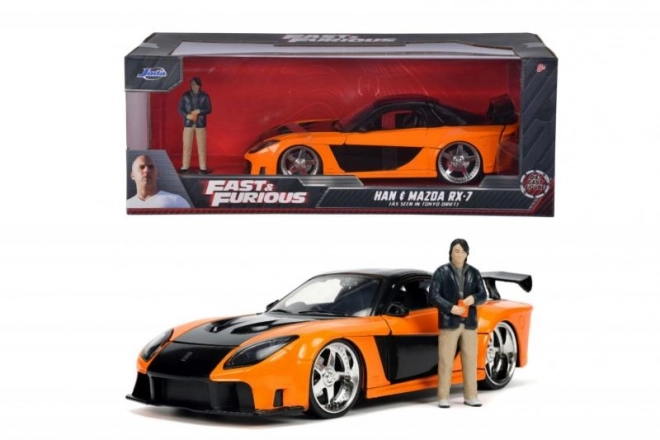 Hitri in drzni model avtomobila 1997 Mazda RX-7 s figurico Han Lue