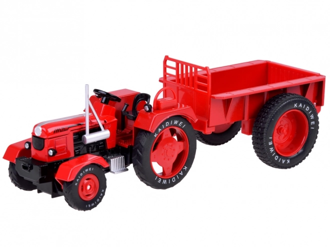 Rdeči kovinski traktor z gumijastimi kolesi 1:18
