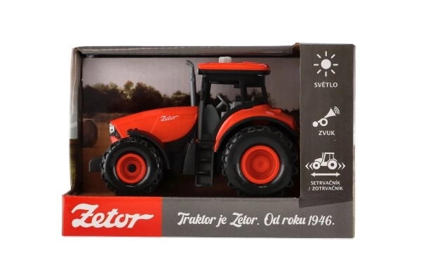 Rdeči traktor Zetor s vztrajnikom z zvočnimi in svetlobnimi učinki