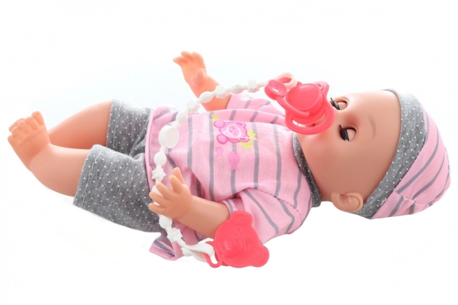 Dojenček, ki lula 28 cm z zvoki in dodatki