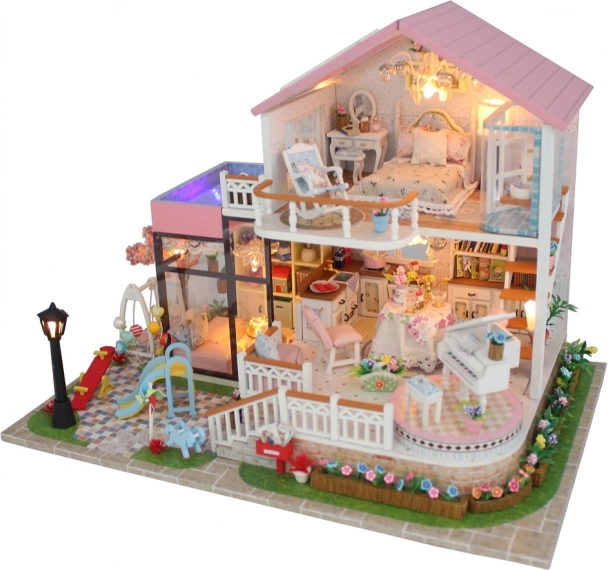 miniaturna hišica prikupna vila z LED osvetlitvijo