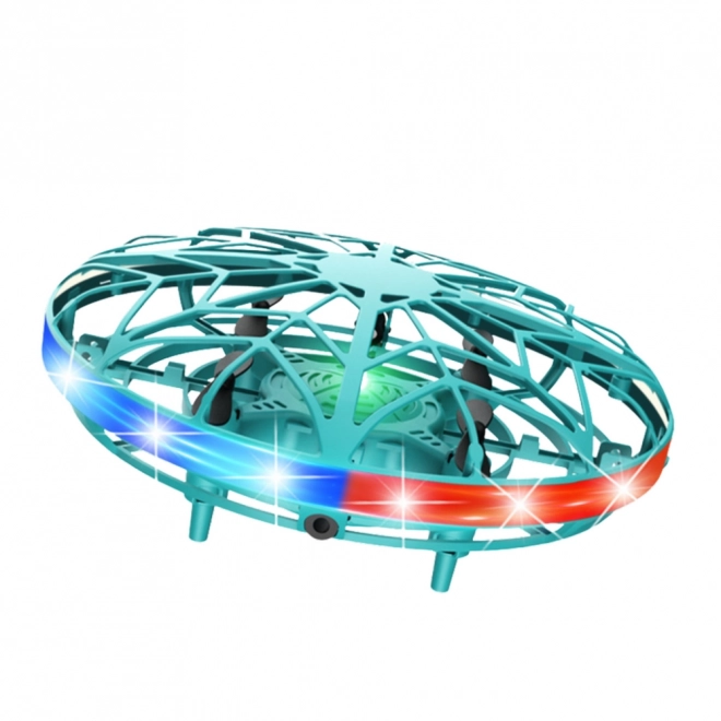 UFO dron lahko upravljan z roko z LED lučkami turkizne barve