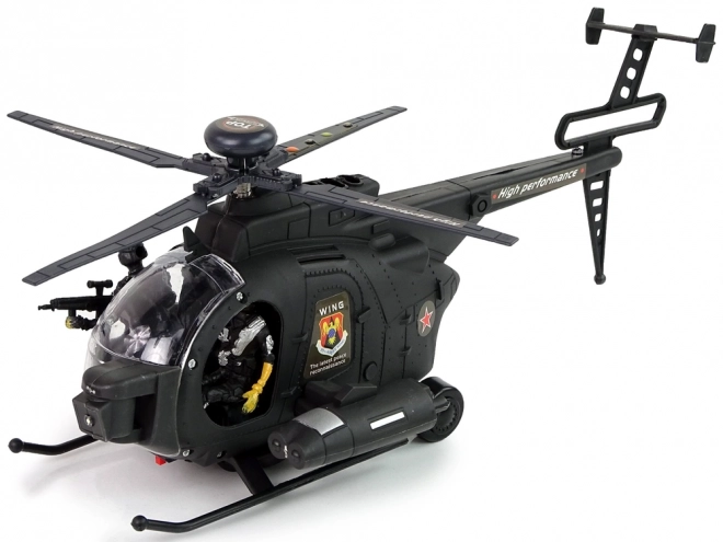 Vojni helikopter s krili in svetlobnimi učinki na baterije