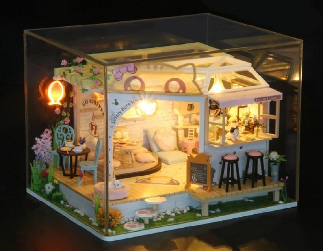 Skupina miniature hiške Mačja kavarna z vrtom
