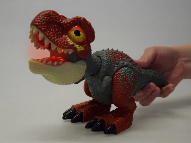 Dinozaver Tyrannosaurus Rex z gibljivimi deli in zvočnimi ter svetlobnimi učinki