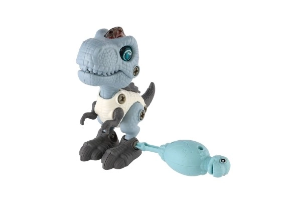Dinozaver vijačen plastičen 12cm z izvijačem na baterije s svetlobo in zvokom v škatlici 15x16x7cm