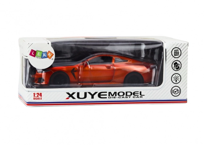Kovinski športni model s trenjem pogonom in odpiralnimi elementi 1:24 oranžen