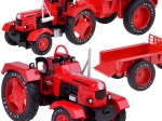 Kovinski rdeč traktor s prikolico 1:18 z gumijastimi kolesi
