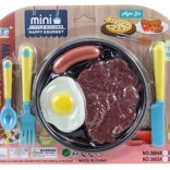 Komplet plastične hrane s priborom in krožničkom