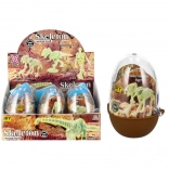 Svetleča dinozavrova kost k v plastičnem jajčku – zbirateljski sestavljivi set