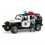 Bruder Jeep Wrangler Rubicon policija s figurico
