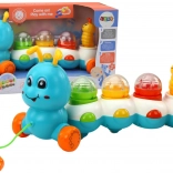 Barvita gosenica na vrvici s svetlobami in zvoki