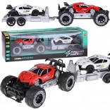 Terensko vozilo s prikolico in športnim avtomobilčkom