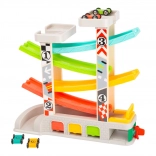 Dirkalna steza s parkiriščem in garažami