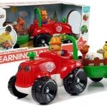 Glasbeni traktor z prikolico in živalmi na baterije