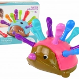 ježek vstavljanka roza z barvnimi bodicami