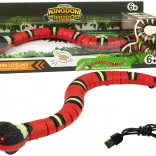 Interaktivna kača na dotik rdeča s črnimi črtami