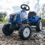 Falk poganjalni traktor New Holland s prikolico in odpirljivim pokrovom motorja od 2 let