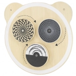 Lesena stenska plošča z vrtečimi se točkami