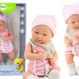 Tkanina Dojenček v Belo-Rožnatem Oblečenju s Kapo in Dudko