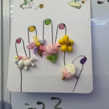 Prstani z motivom cvetov in samorogov