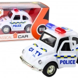 Klasični policijski avto 1:38 s pogonom, lučmi in zvoki, bel